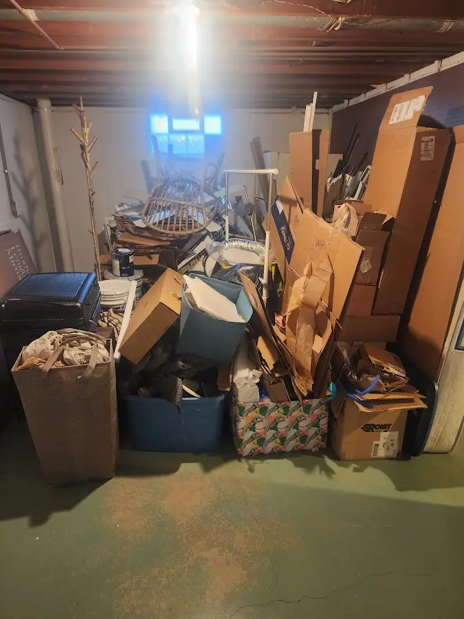 Roll-off dumpster container at job site for Construction Dumpster Rental in Pratt